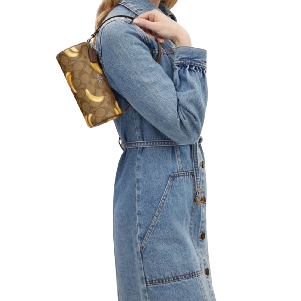 Coach Nolita Barrel Bag In Signature Canvas With Banana Print - Picture 8 of 14